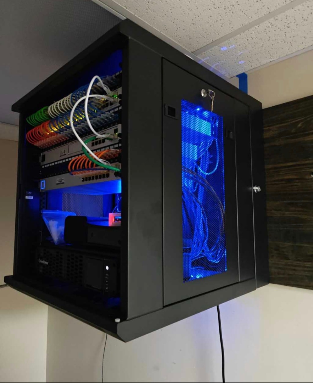 After: organised blue-lit rack
