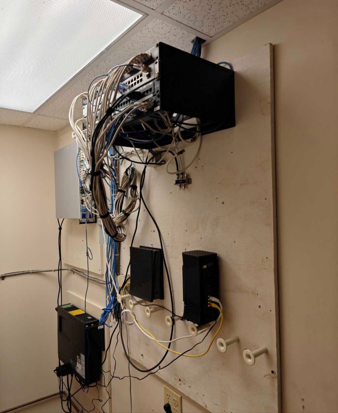 Before: tangled server room cables